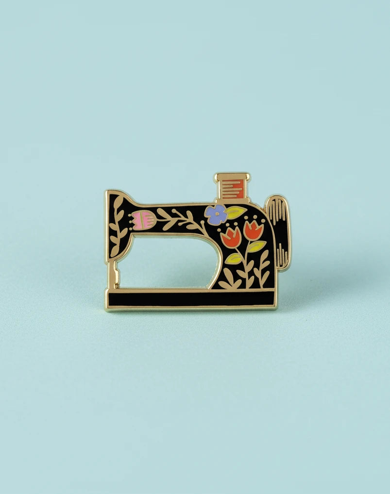 Máquina de coser floreada