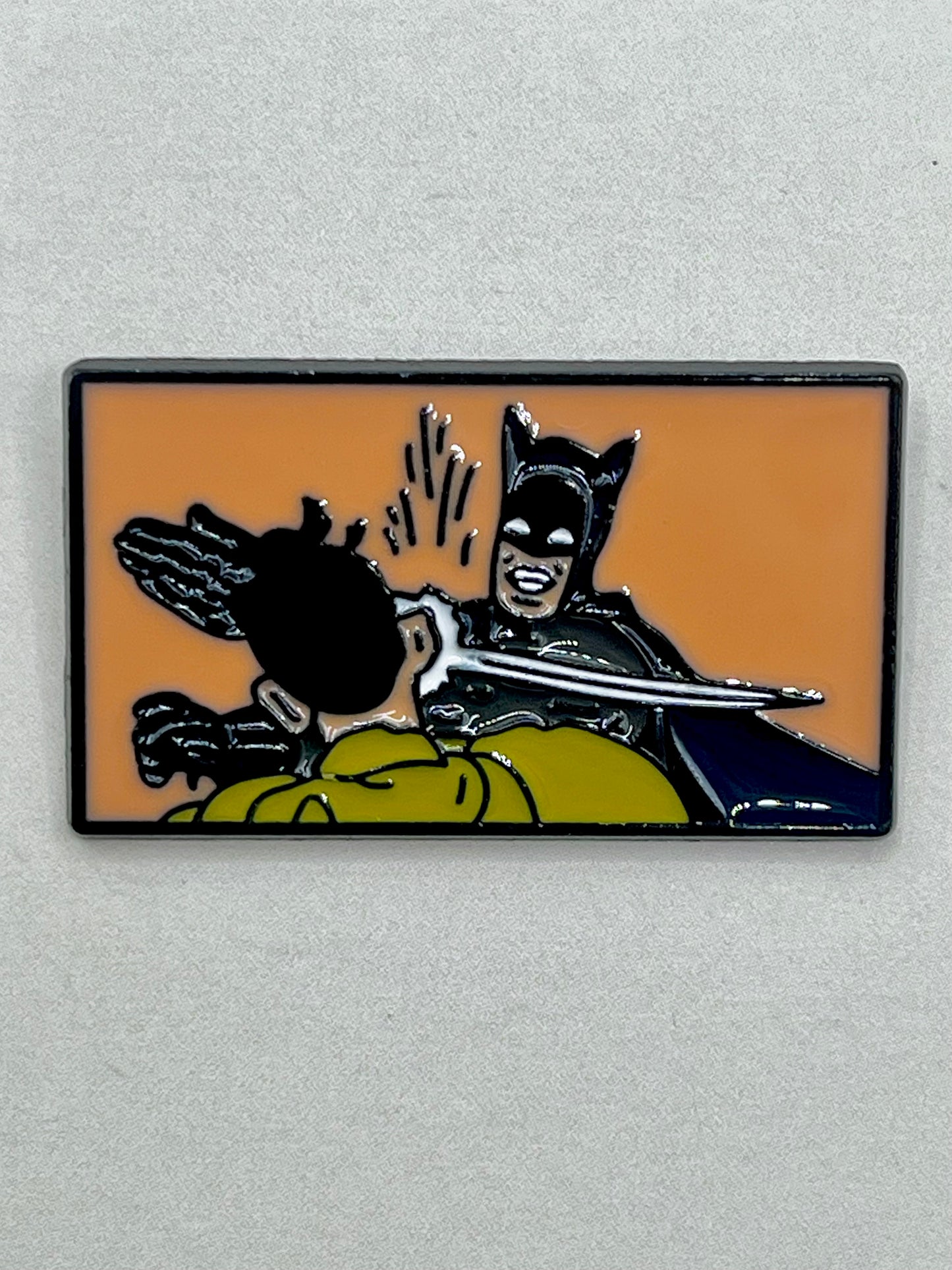 Batman slapping Robin