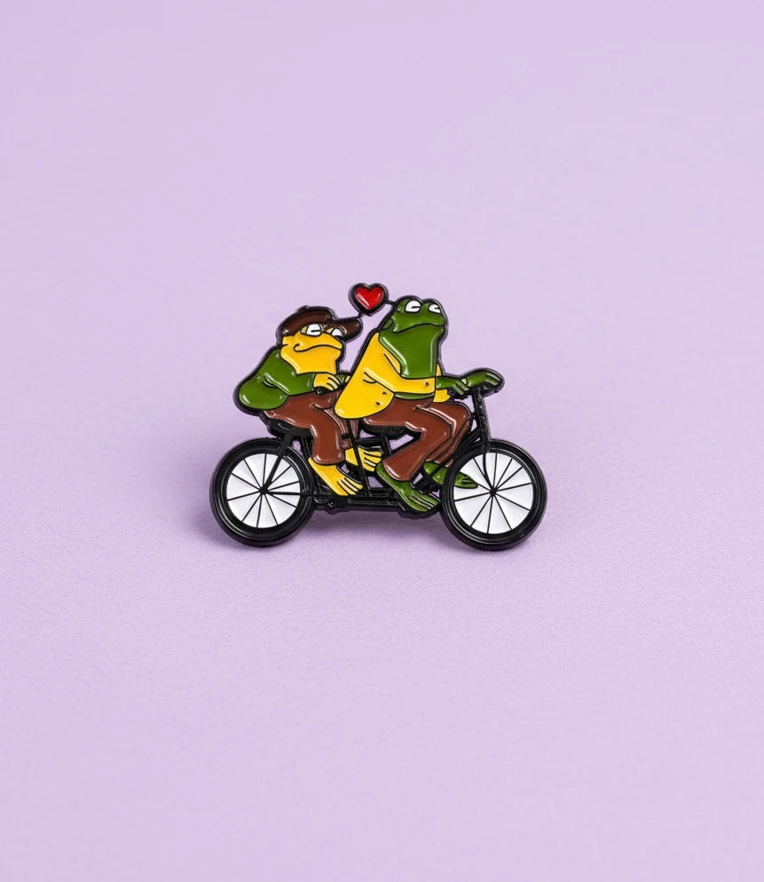 Frog y Toad montando bicicleta