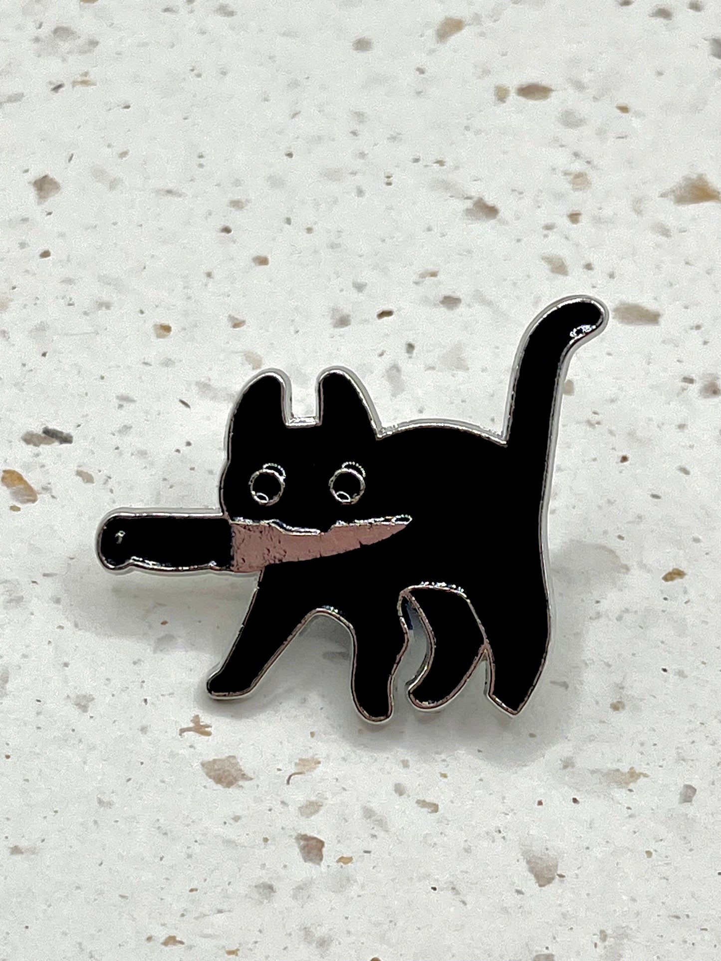 Gatito con cuchillo