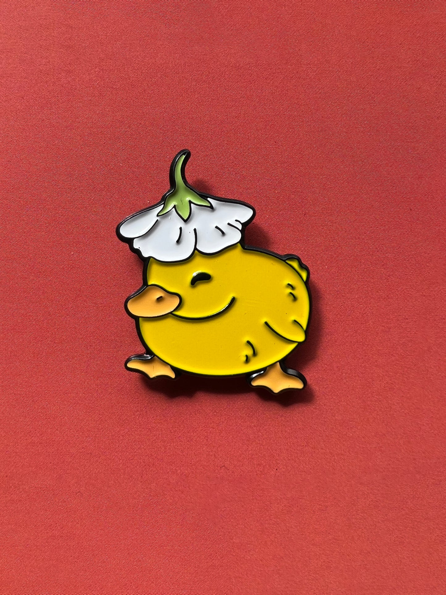 Patito con flor